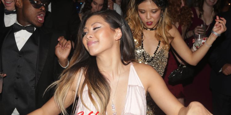 Woman dancing at Capital Gatsby New Year's Eve Masquerade Ball 2019 at The Showroom. This is the first and last time the 2 events (Capital Gatsby and Masquerade Ball) were combined. This took place at The Showroom in Washington DC.