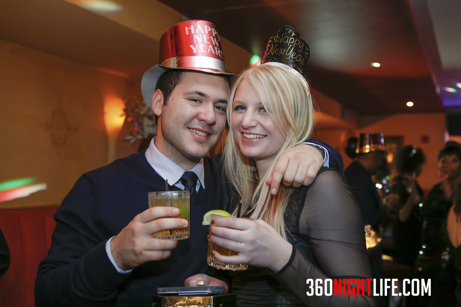 A couple celebrating New Year's Eve in Washington DC at the 90's New Year's Eve Party - Back in Da Day - Presented by 360nightlife.com